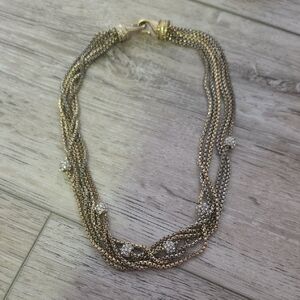 Elegant Gold and Silver Multi-Strand Necklace